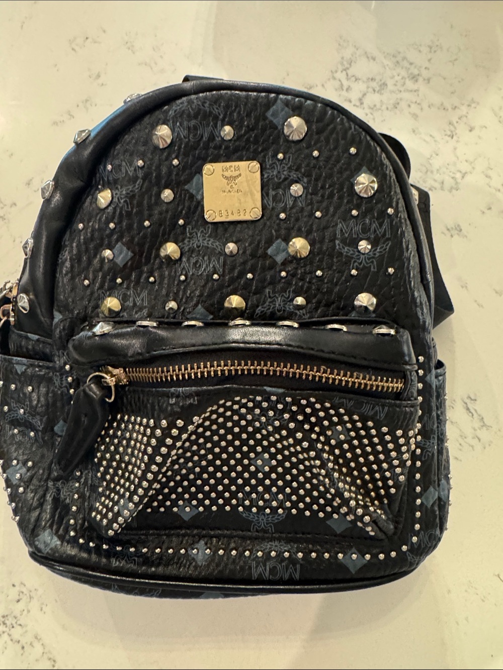 MCM Black Studded Monogram Mini Backpack with Gold Plate
